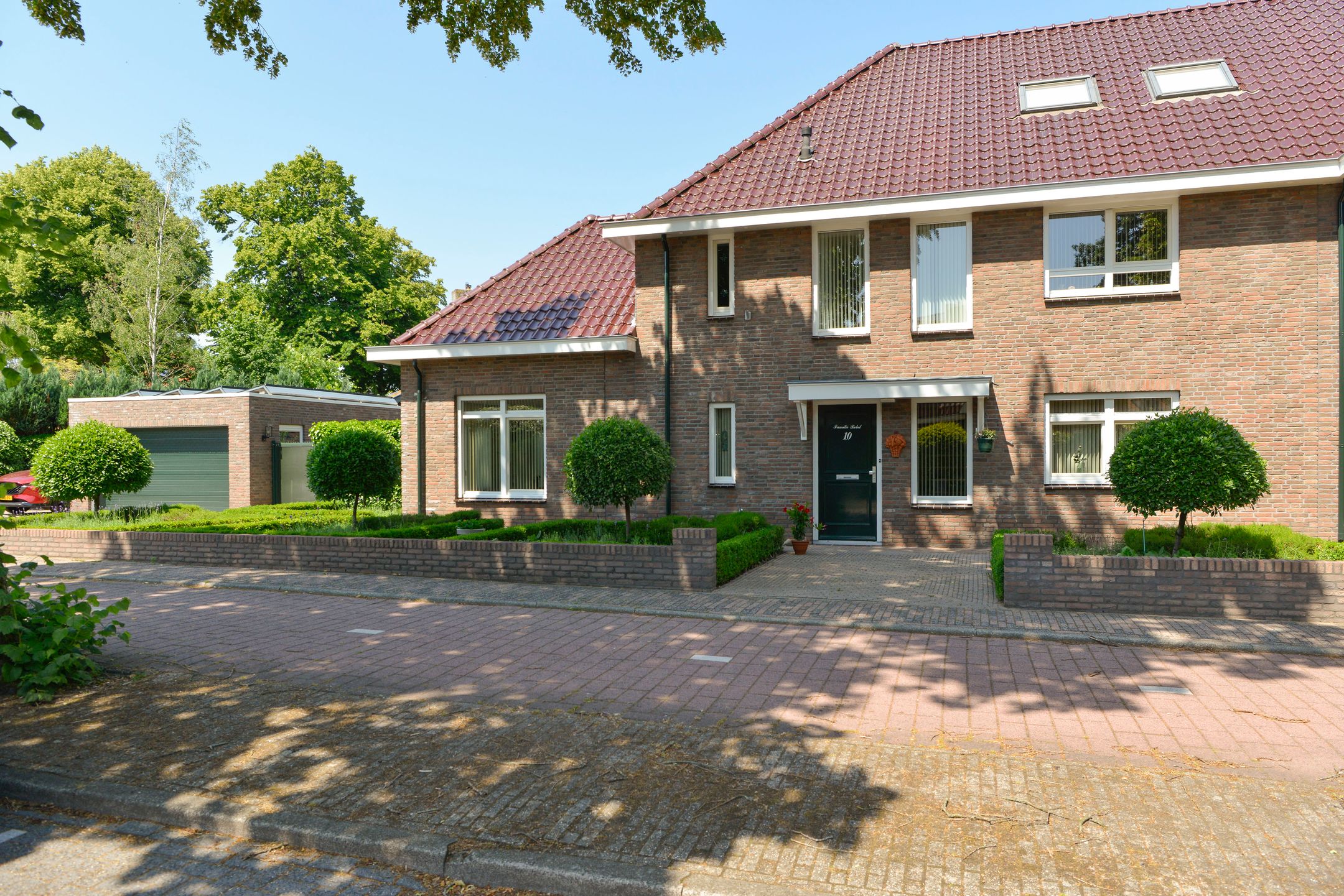 Foto van Bovenlangewijnseweg 10, Huizen