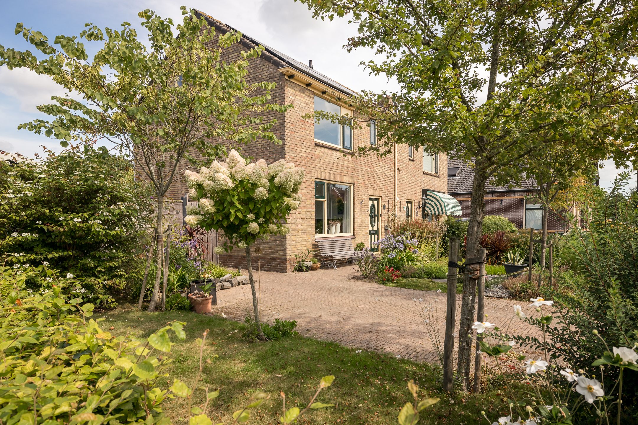 Foto van Hemmerbuurt 46, Hem