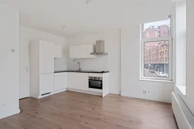 Foto van Nieuwe Binnenweg 438A 01, Rotterdam tussenverdieping