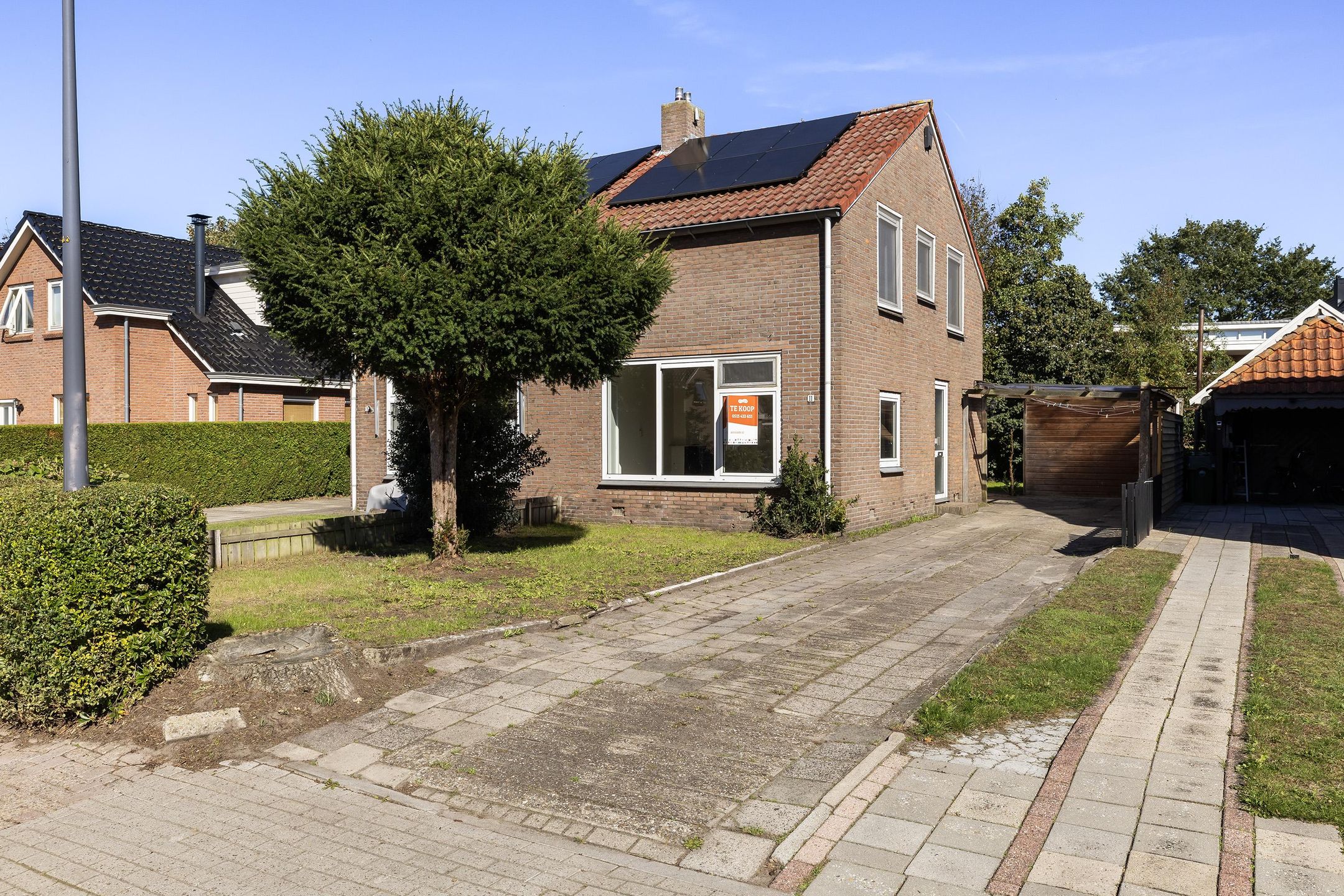 Foto van Molenweg 11, Nieuwehorne 2-onder-1-kapwoning