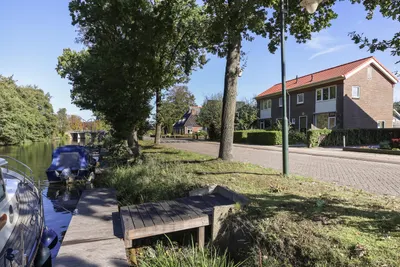 Foto van Kanaelsloane 8, Opeinde 2-onder-1-kapwoning